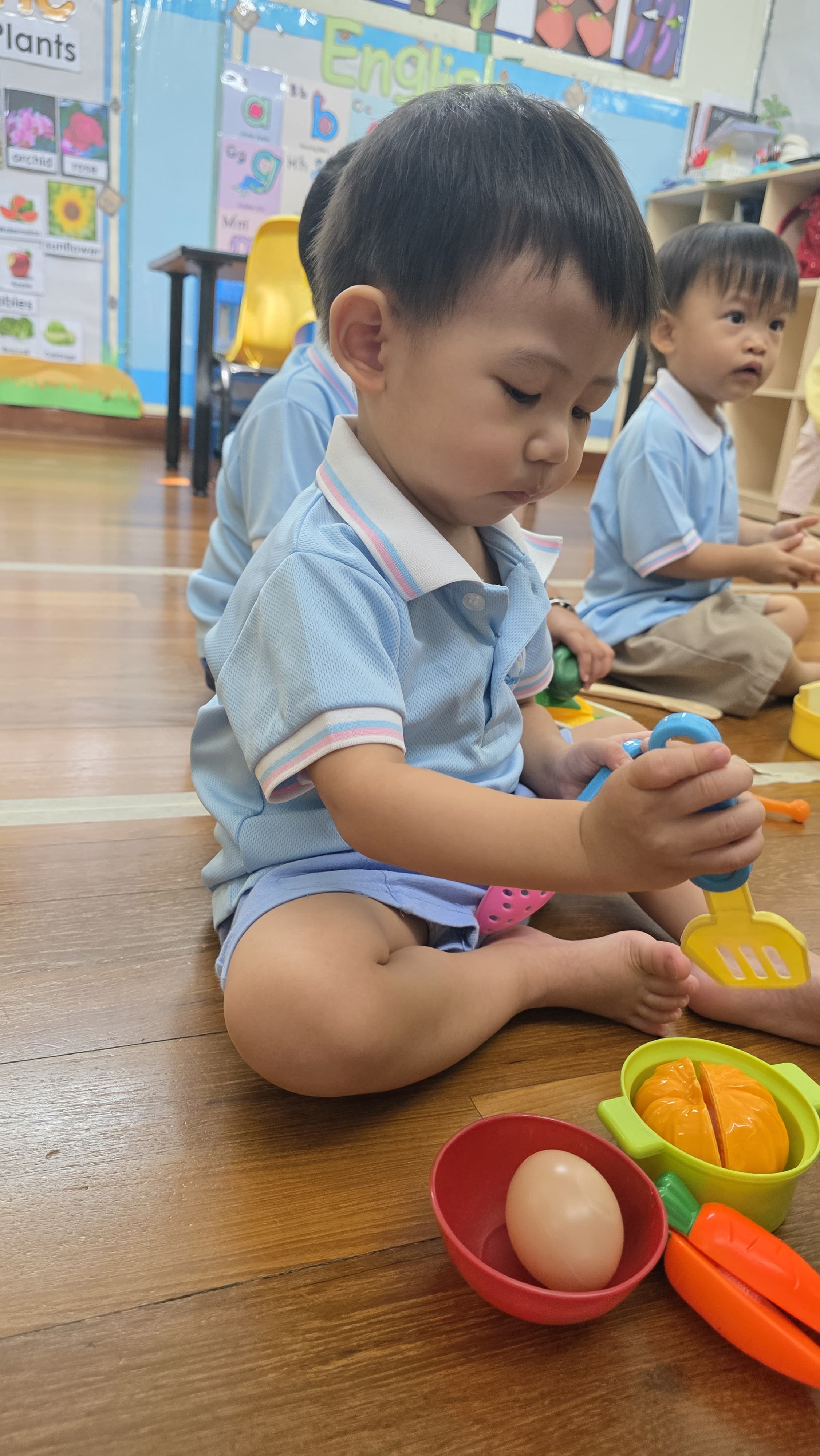 Playgroup children at Genius Gems Childcare Centre engaged in hands-on early learning